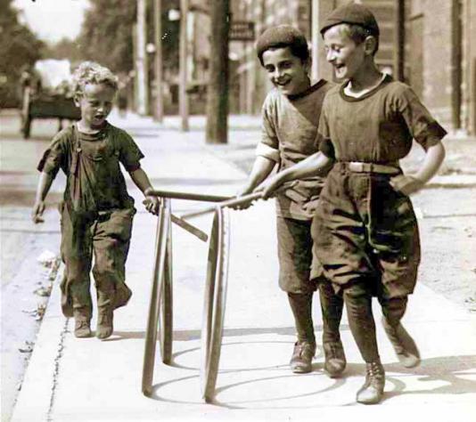http://www.victorianchildren.org/wp-content/uploads/2014/02/Victorian-Toys-and-Games-Hoop-and-stick.jpg