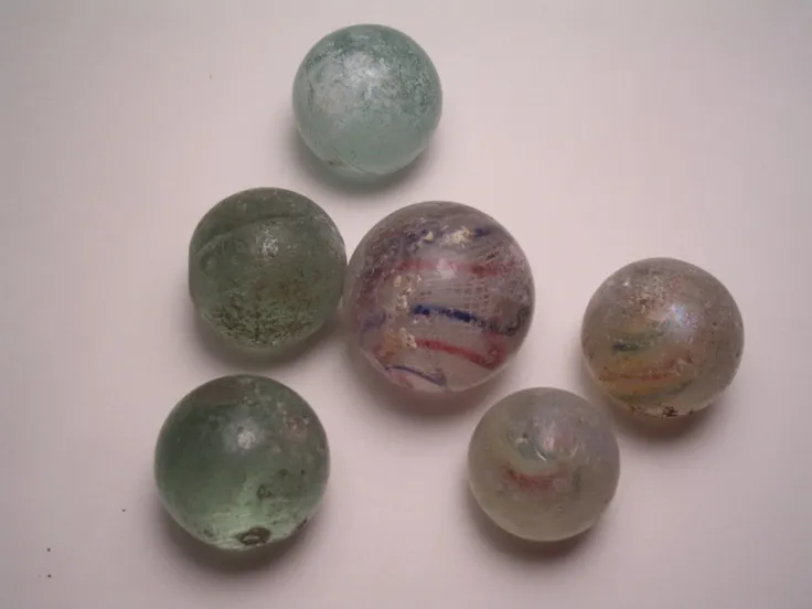 Victorian children playing marbles
