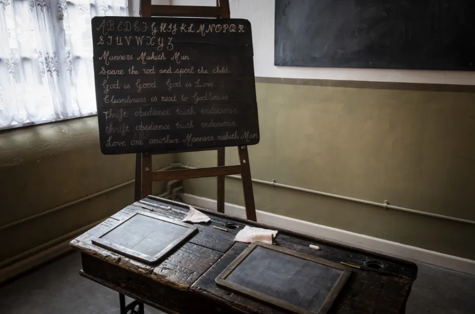 Victorian school equipment including slate and chalk